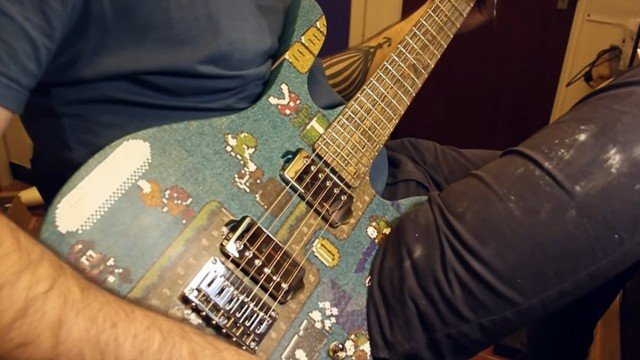 Пиксельная гитара из палочек для леденцов (13 фото)