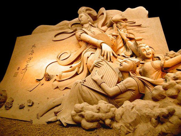 Скульптуры из песка от чемпиона мира по песочному искусству (14 фото)